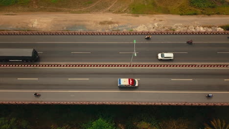 aerial view of highway bridge with traffic