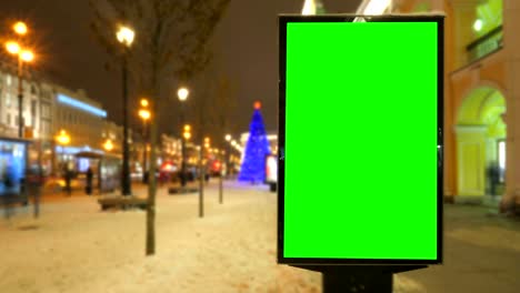 un cartel con una pantalla verde
