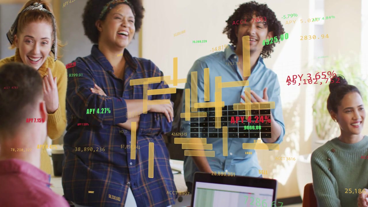 Standing trio reacting, discussing as laptops updating sheets and AR finance charts guiding review