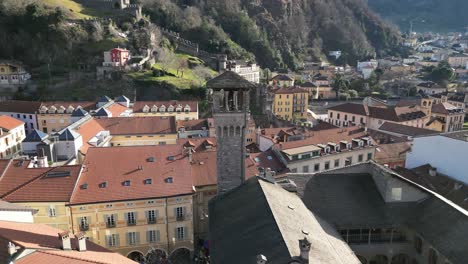 bellinzona switzerland church bell tower rotating aerial view on sunny day