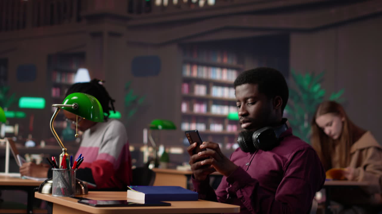 Vertical video rude man answering a phone call in the library and disturbing people