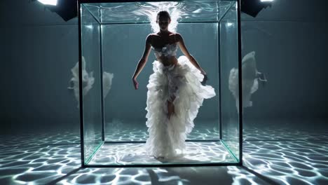 woman in a white dress underwater