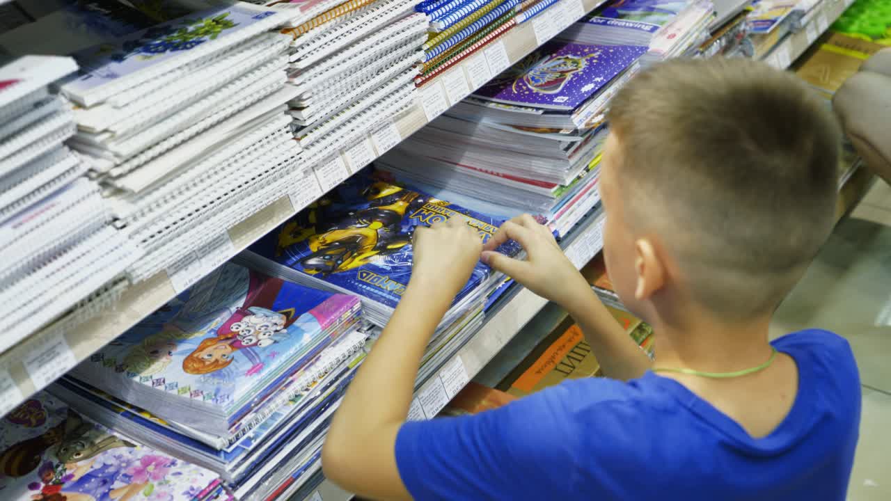 Vinnitsa, Ukraine - August, 2018: Purchase of school stationery in the store.
