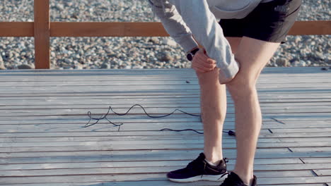 man exercising by the beach