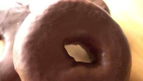 macro shot of a chocolate donuts