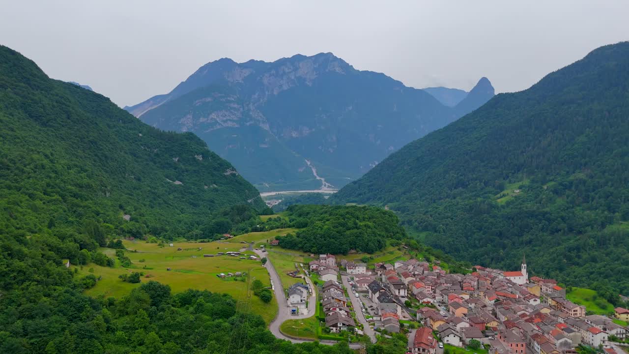 Experience the stunning landscapes of Igne through drone footage, highlighting its scenic beauty and the majestic Dolomites.