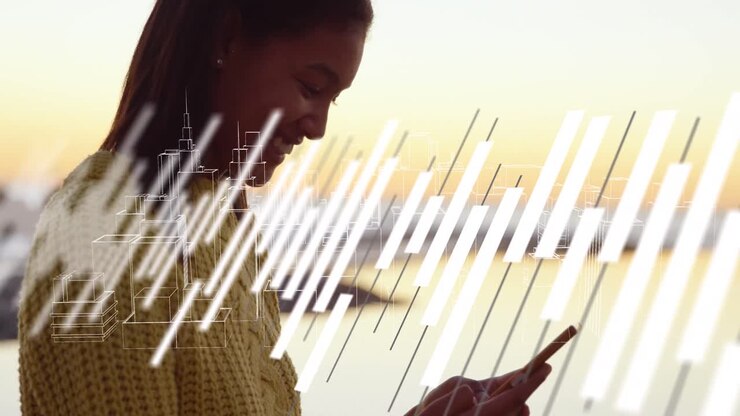 Animation of graphs over hands of biracial woman using smartphone