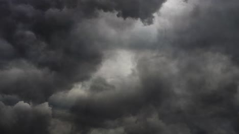 a time lapse of dark storm clouds