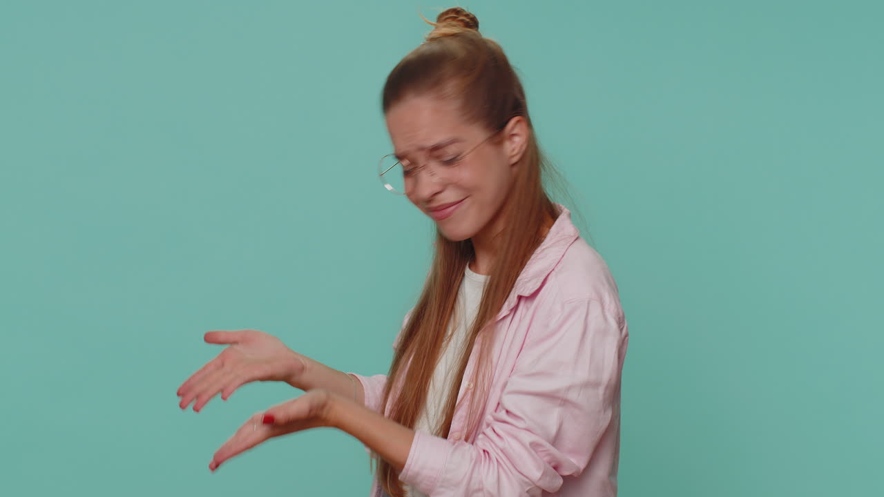 Girl raising hands asking what why reason of failure, demonstrating disbelief irritation by troubles