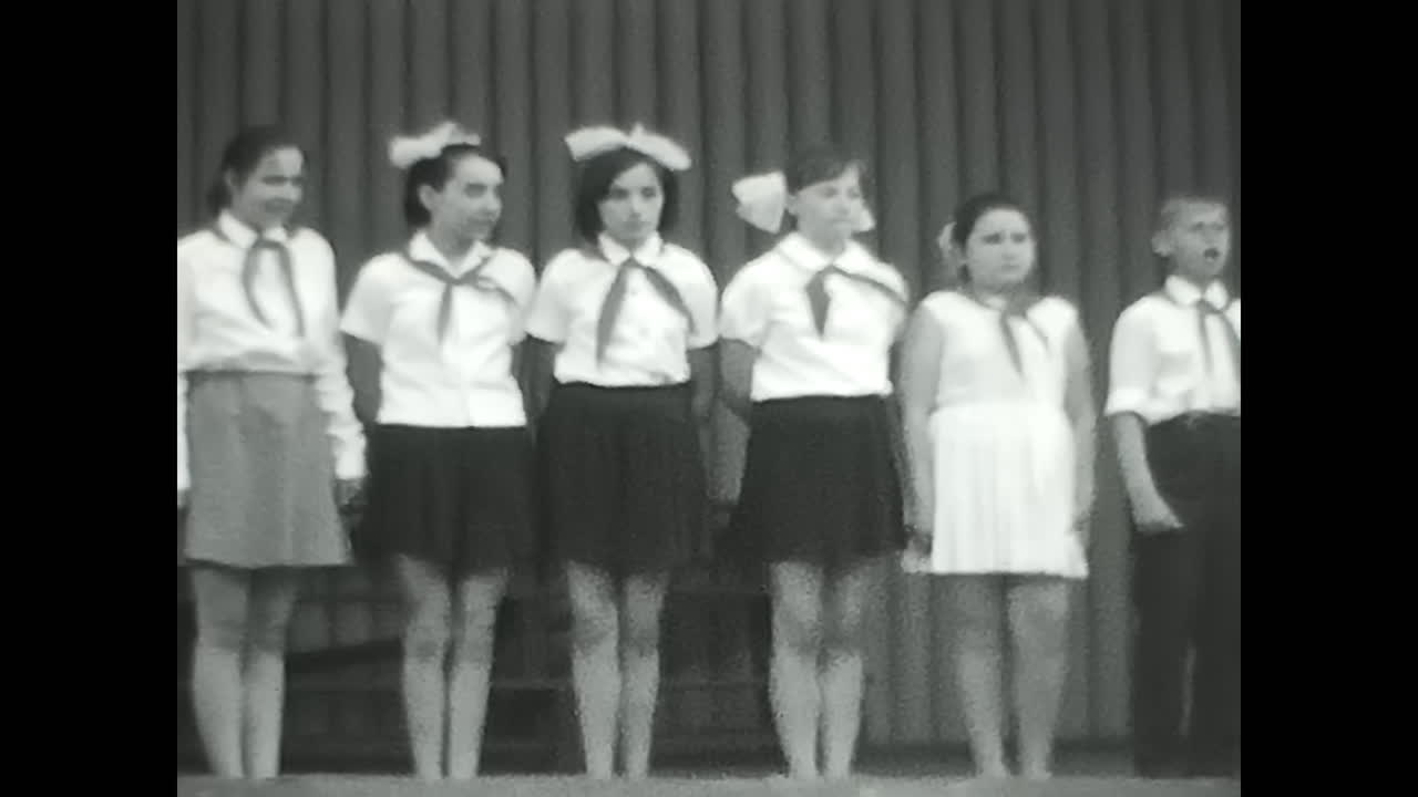 Group of Young Pioneers Standing on Stage. CIRCA USSR 1970: Group of Young Pioneers Standing on Stage