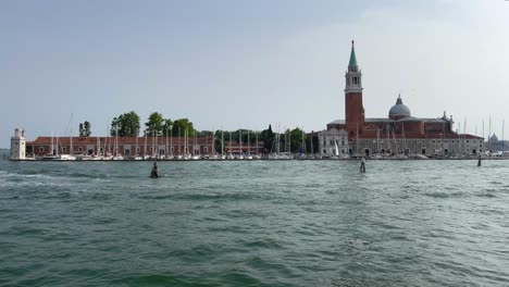 Wide-View-of-Piazza-San-Marco-From-a-Boat-On-Water-in-Venice,-Italy