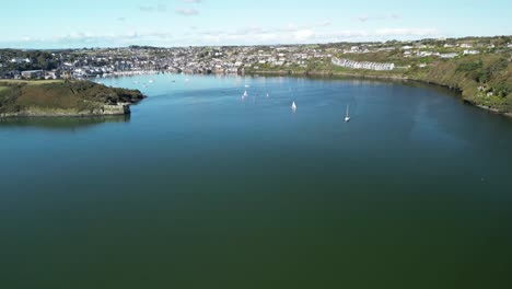 Aerial View of a Coastal Town with Sailboats