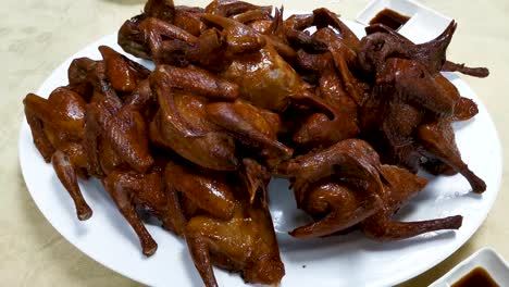 delicious bbq pigeon at lung wah hotel, sha tin, hong kong's famous restaurant, close up