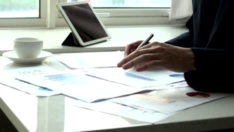 business man working with paper work in the office