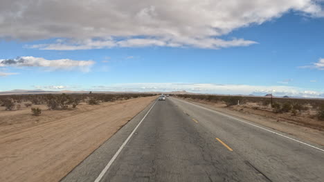 looking out the rear window while driving through the mojave desert, california - hyper lapse