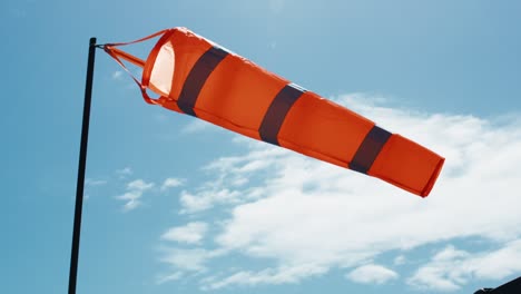 windsock with blue sky on background