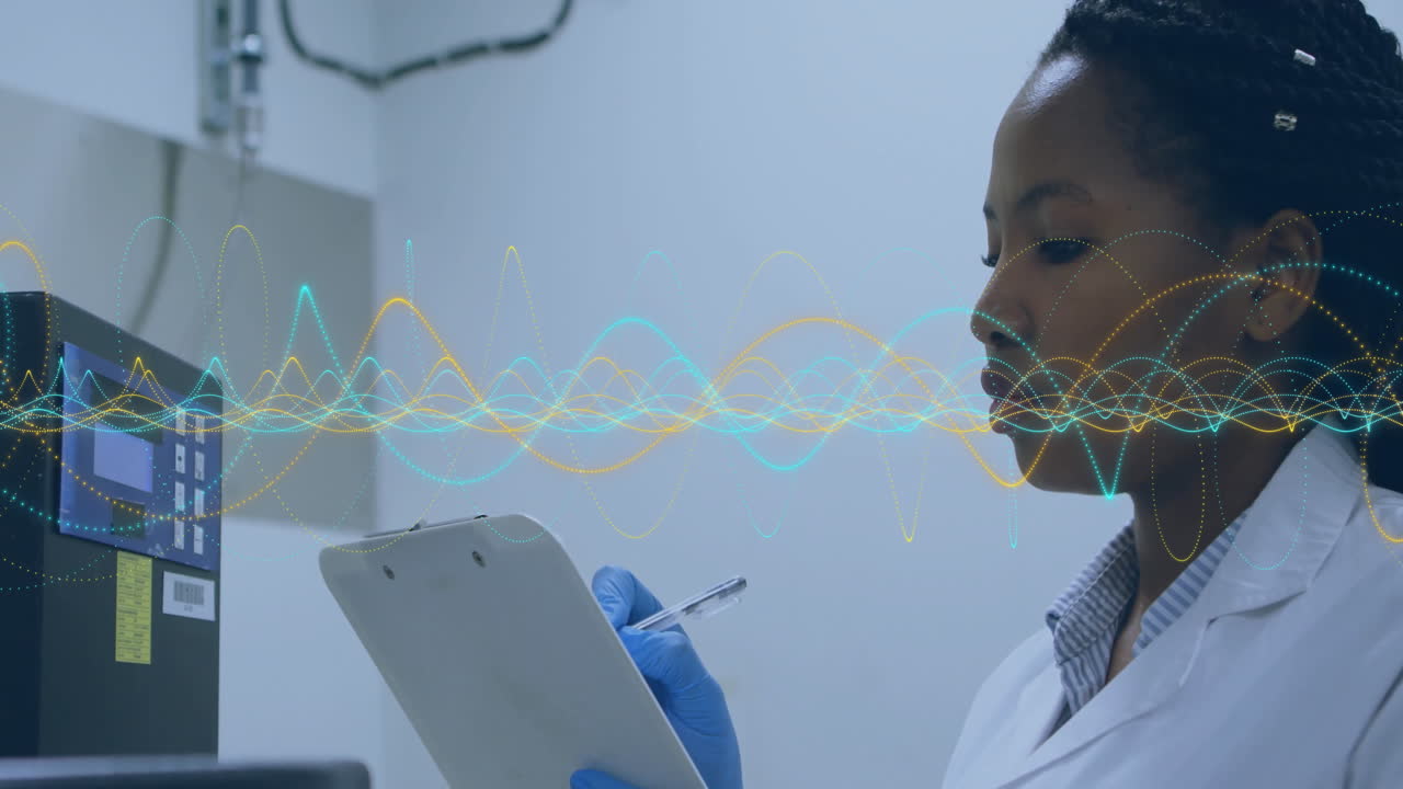 Analyzing data with digital waveforms, scientist working in laboratory environment