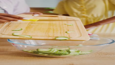 preparing a cucumber salad