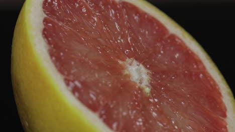 delicious grapefruit cut for squeezing fresh juice. grapefruit half