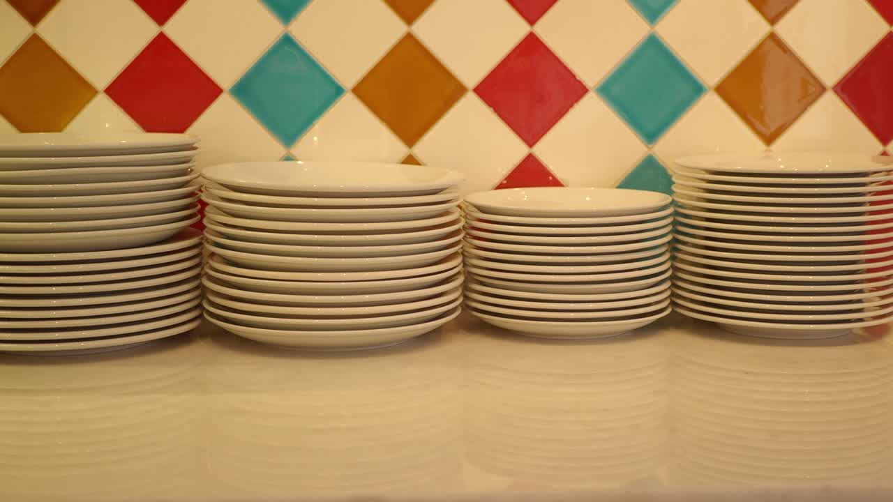 Stacks of white plates