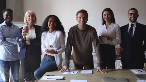 group of different ages multiracial business people in modern office.