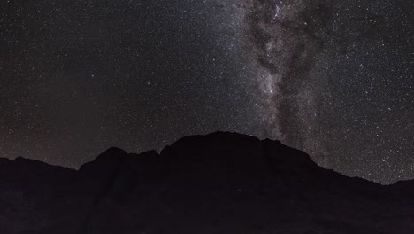milky way over mountains at night