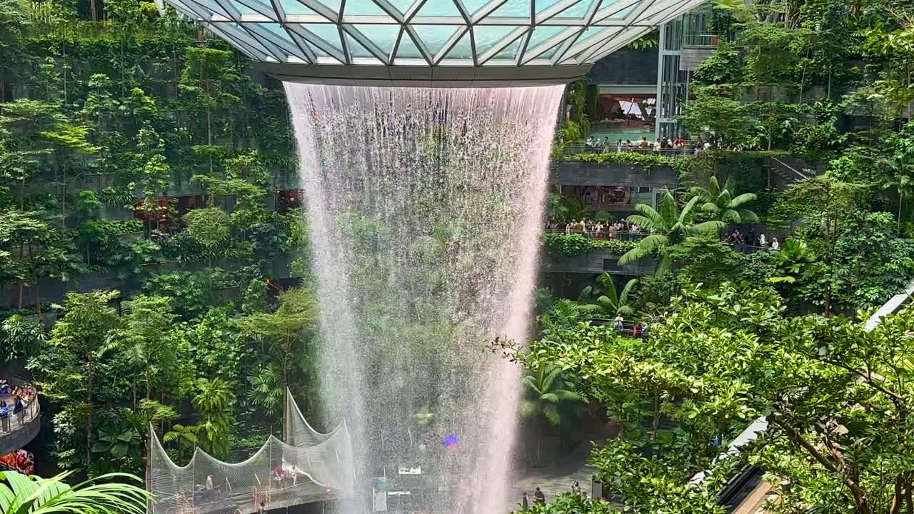Singapore Jewel Indoor Waterfall Vortex at Changi Airport - panning down tight frame to base