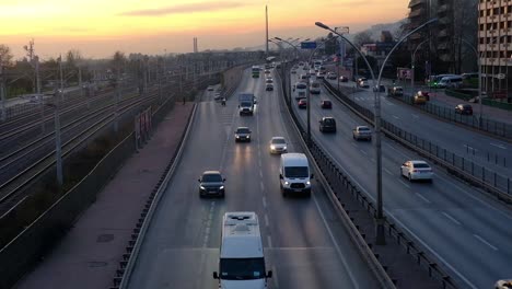 vehicles moving on highway in reddish air