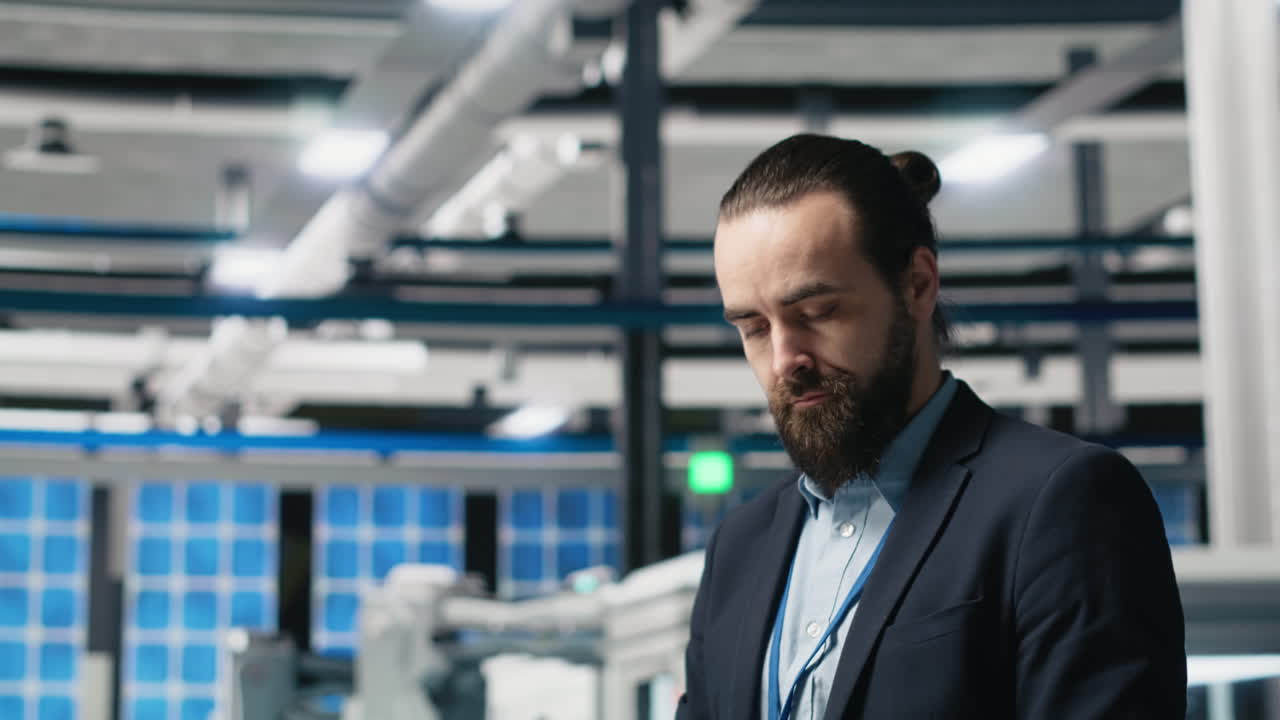 Man in Suit at Factory