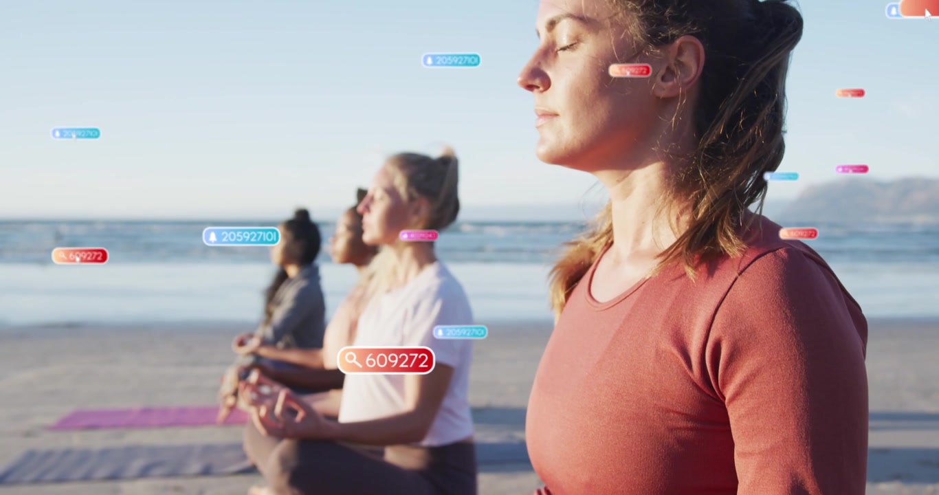 Four women meditating on beach, camera pulling back spawning floating health labels tracking breath