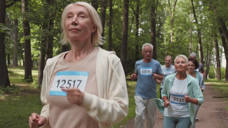 Senior Citizens Running in a Park