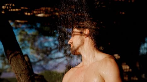 man taking bath in shower 4k