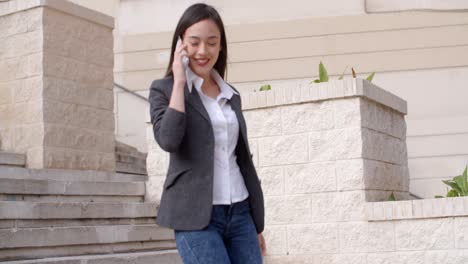 young woman chatting on her mobile