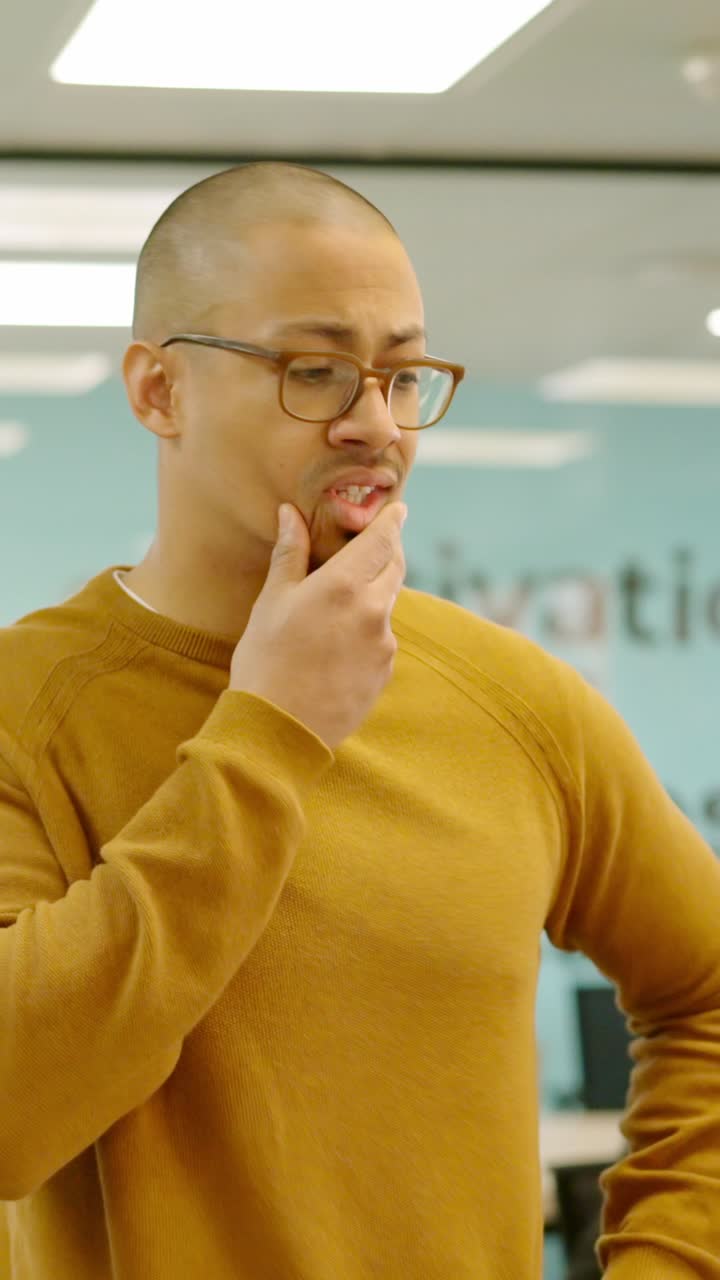Man collects his belongings from an office after being fired