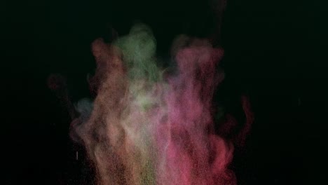 the explosion of bright colored particles. slow motion