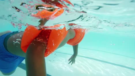 Boy-swimming-in-pool