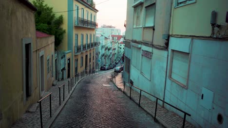 lisbon ancient stone pavement street at rising