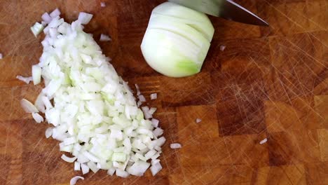 finely chopping an onion with a knife