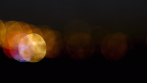 animation of light spots on black background