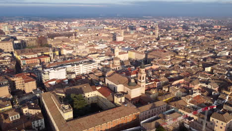 aerial pullback panoramic cityscape view over parma, emilia-romagna, italy