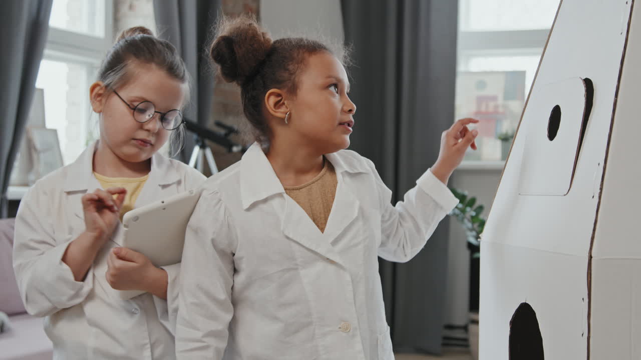 Girls Playing Scientists at Home