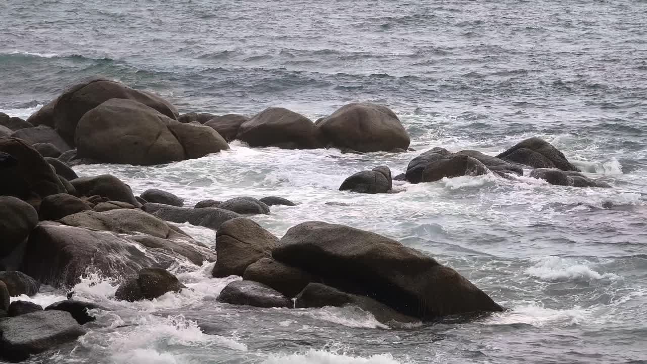 Waves crashing on a rocky coastline