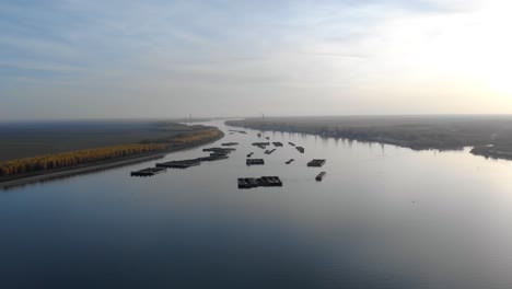 Aerial-View-Of-Floating-Pontoons-On-Danube-River-At-Sunrise