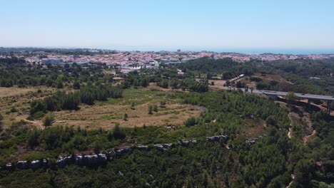 AERIAL-Side-Panning-Shot-of-Portuguese-Hinterland-nearby-Cascais,-Portugal