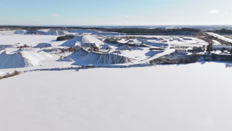 james dick quarry in caledon village, covered in snow on a sunny day, aerial view