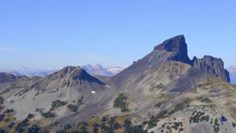 black tusk mountain peak from panorama ridge against blue sky in garibaldi provincial park of britsh columbia, canada