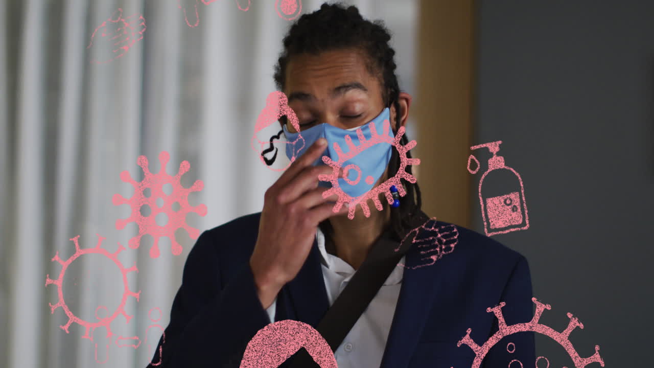 animación de iconos de la pandemia sobre un hombre biracial con máscara facial