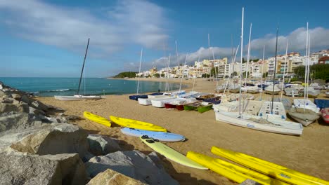 platja de les barques sea field maresme barcelona mediterranean coast plane close to turquoise blue transparent water beach without people