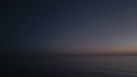 Moon,-planets-and-stars-over-sea-ocean-horizon