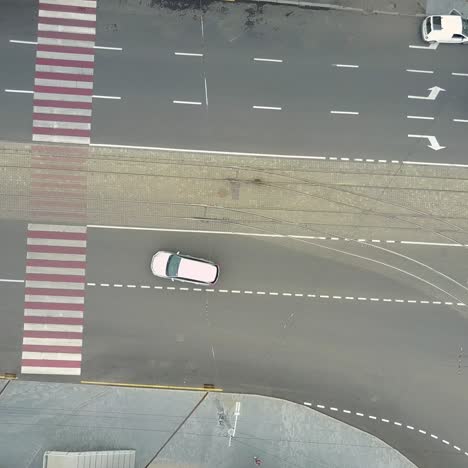 traffic jam and urban transport. crossroads in the city, cars drive through part of the road, aerial view